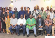 • Dr Aubynn (seated, third from left) with other participants at the programme