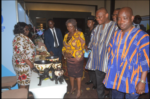 Vice President, Prof Opoku-Agyemang (middle) inspecting some exhibits on display. With her is Mr Mensah (second from right) and other dignitaries Photo: Victor A. Buxton