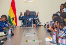 • Mr Opoku brieng the press