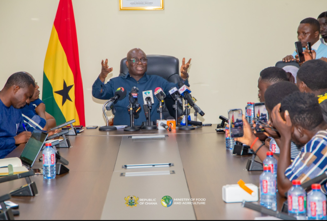 • Mr Opoku brieng the press