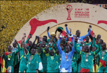 Senegal's Sadio Mane lifts the trophy with teammates as they celebrate after winning the Africa Cup of Nations