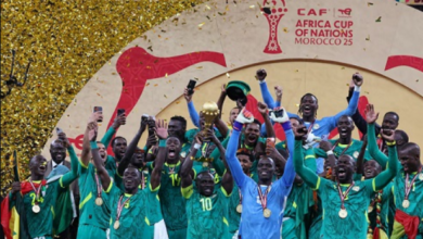 Senegal's Sadio Mane lifts the trophy with teammates as they celebrate after winning the Africa Cup of Nations