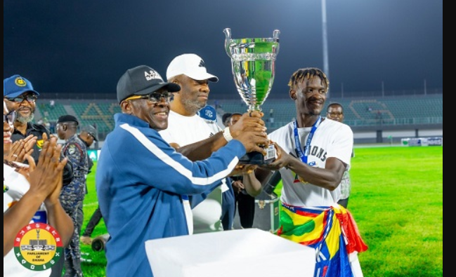 Flashback Mr Alban Bagbin presents the trophy to a Hearts of Oak's skipper Kelvin Osei Asibey during the last edition