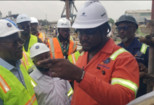 Dr Sippa Yankey (left) being conducted round the facility