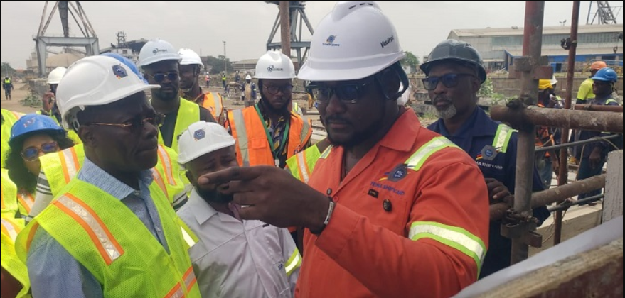 Dr Sippa Yankey (left) being conducted round the facility