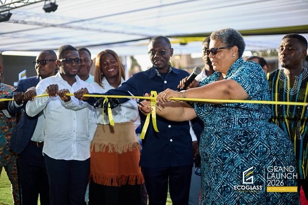 Mrs Tetteh-Agbotui (right) being assisted by other dignitaries to cut the tape for the opening of the facility