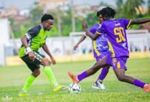 A Dreams FC defender (left)attempts to stop a Medeama SC attacker