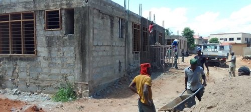 Workers working on the Abokobi Polyclinic project