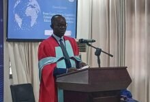 Dr Antwi-Boasiako (inset) speaking at the programme