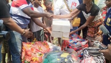 Dr Arikor presenting the items to Ms Nyakwa during the visit Photo Victor A. Buxton