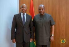 Mr Fihla (left) with President Mahama after a meeting