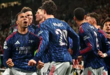 Arsenal players celebrating the only goal