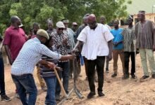 Dr Apaak (front row, second from right) with the contractor and other at one of the sites
