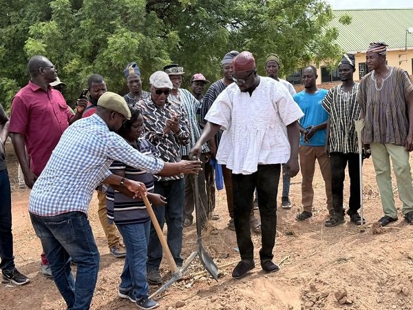 Dr Apaak (front row, second from right) with the contractor and other at one of the sites