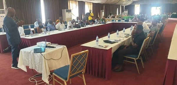 Mr Appiah (standing) speaking at the stakeholders engagement