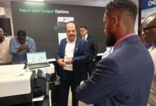 Mr Kamal Gugliani (middle), Service Operations Manager, explaining the function of the machine