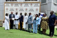 Alhaji Muntaka Mohammed-Mubarak (third from left) receiving the items on behalf of NADMO