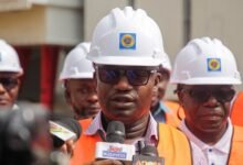 Dr Jinapor (inset) breifing the press after the inspecting