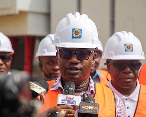 Dr Jinapor (inset) breifing the press after the inspecting