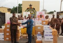 Mr Adu (right) handing over the items to DDP Edward Ashun. Photo Ebo Gorman,
