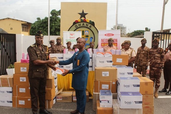 Mr Adu (right) handing over the items to DDP Edward Ashun. Photo Ebo Gorman,