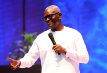 Apostle Mensah delivering the sermon