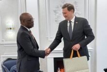 Dr Jehu-Appiah (left) and Mr Ryzhenkov exchanging pleasantries