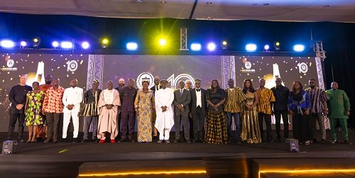 Mrs Ofosu-Adjare (eight from left) with the awardees after the event