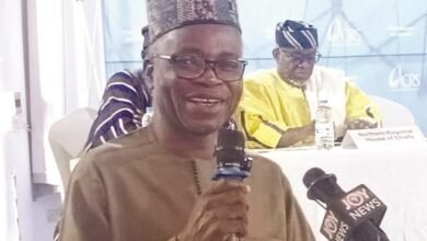 Mr Mburidiba (inset) addressing participants at the workshop