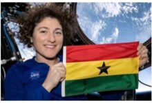 Christina Koch with Ghana flag