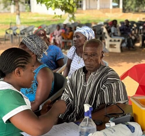 A nurse taking vitals at the health screening