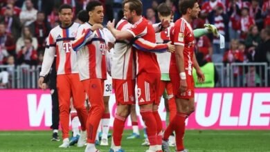 Kane celebrates with Bayern Munich teammates after winning the 2025-26 Bundesliga title