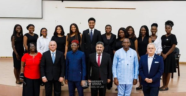 The beneficiaries with the officials of the Community and faculty members after the presentation ceremony