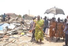 Nii Konfeh IV (second from right) with other Council members at the demolition site Photo Victor A. Buxton