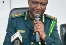 Comptroller-General Basintale Amadu (inset) addressing the officers