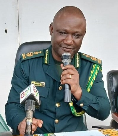 Comptroller-General Basintale Amadu (inset) addressing the officers