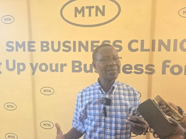 Nii Sackey (inset) addressing participants at the workshop