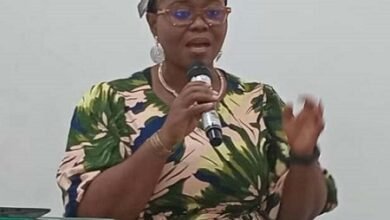 Ms Olatayo (inset) addressing the participants at the programme