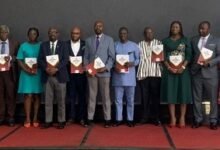 Dr Taher (ninth from right) with other dignitaries at the programme