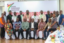 Mr Lartey Otu and Mr Akpokavie (seated second and third from right) with guests and participants after the opening ceremony
