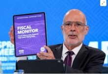 Mr Rodrigo Valdes displays the IMF Fiscal Monitor at its meeting in Washington yesterday