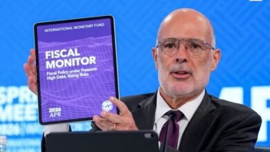 Mr Rodrigo Valdes displays the IMF Fiscal Monitor at its meeting in Washington yesterday