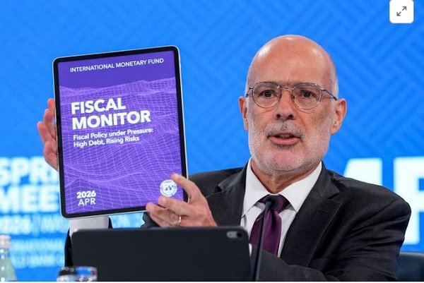Mr Rodrigo Valdes displays the IMF Fiscal Monitor at its meeting in Washington yesterday