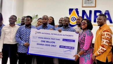 Mr Tameklo (third from left) presenting the ceremonial cheque to Ms Obuobia Darko-Opoku (second from right) and other members of both organisations present