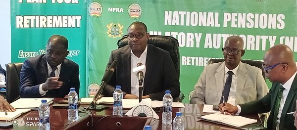 Mr Mejida (second from left) addressing the media . With him are other senior management staff