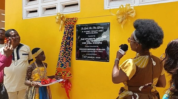 Officials unveiling the plaque of the building