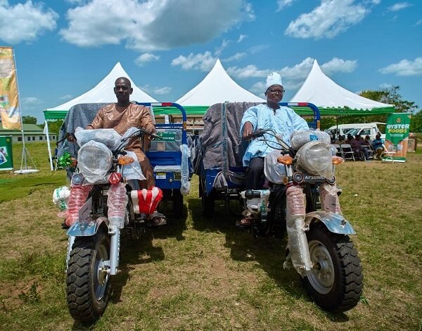 Beneficiary farmers with their tricycles to aid their farming activities