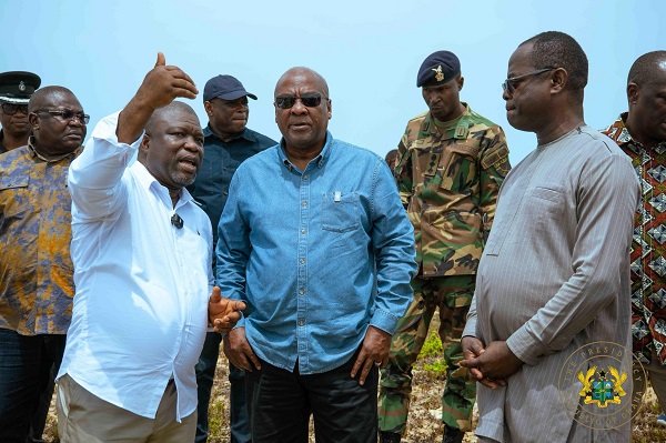 President Mahama (middle) being briefed on tidal waves affected communities by Mr Gunu (left)