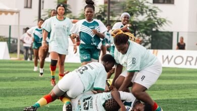 Princess Avorkah (left) and team mate Hilaria Wuaku tackling a Nigeria player