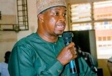 Mr Gong (inset) addressing the students at the programme